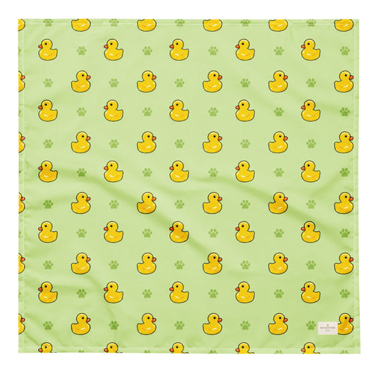 Rub-a-dub duck dog bandana featuring rubber ducks and paw prints on a green background by HoneyPaw Pets
