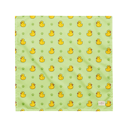 Rub-a-dub duck dog bandana featuring rubber ducks and paw prints on a green background by HoneyPaw Pets