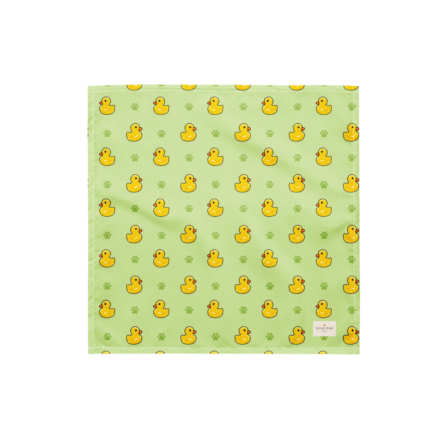 Rub-a-dub duck dog bandana featuring rubber ducks and paw prints on a green background by HoneyPaw Pets
