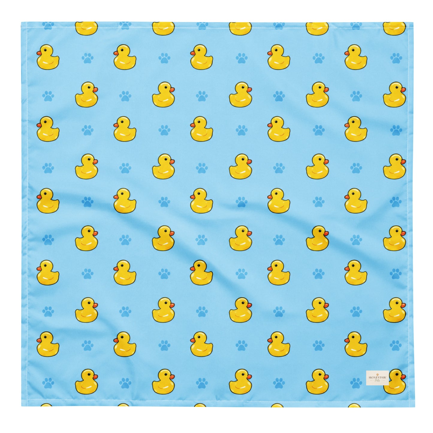 Splish Splash duck dog bandana featuring rubber ducks and paw prints on a blue background by HoneyPaw Pets