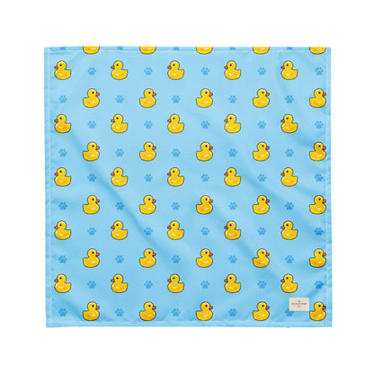 Splish Splash duck dog bandana featuring rubber ducks and paw prints on a blue background by HoneyPaw Pets