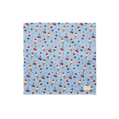 Stars and Sprinkles dog bandana featuring a patriotic ice cream and cherry pattern on a light blue background by HoneyPaw Pets.