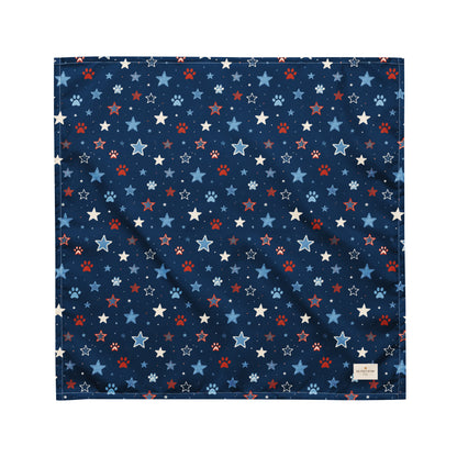 Stary Pup dog bandana featuring red, white, and blue stars with paw prints on a navy blue background by HoneyPaw Pets.