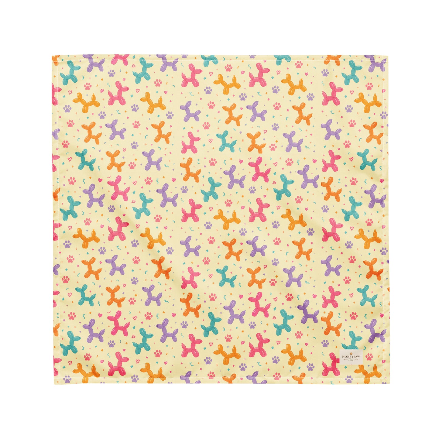 Sunny Squeaks birthday dog bandana featuring colorful balloon animals, confetti and paw prints on a light yellow background by HoneyPaw Pets