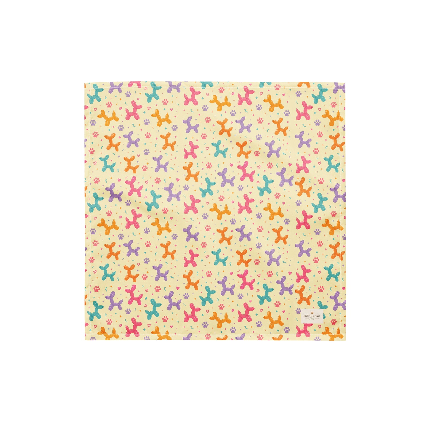 Sunny Squeaks birthday dog bandana featuring colorful balloon animals, confetti and paw prints on a light yellow background by HoneyPaw Pets