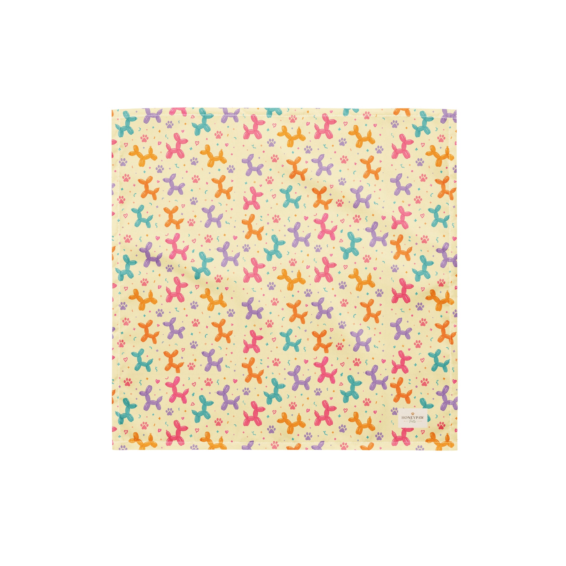 Sunny Squeaks birthday dog bandana featuring colorful balloon animals, confetti and paw prints on a light yellow background by HoneyPaw Pets