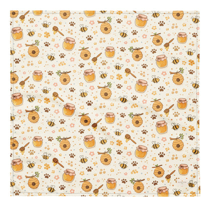 Sweet as Honey dog bandana featuring honey jars, beehives, buzzing bees, and paw prints on a cream background by HoneyPaw Pets.