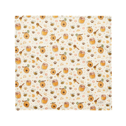 Sweet as Honey dog bandana featuring honey jars, beehives, buzzing bees, and paw prints on a cream background by HoneyPaw Pets.