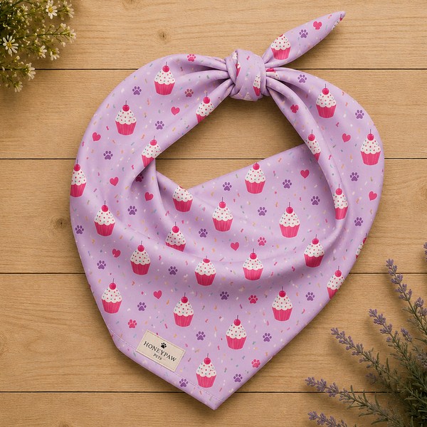 Sweet Celebrations birthday dog bandana featuring colorful cupcakes, hearts and paw prints on a light purple background by HoneyPaw Pets