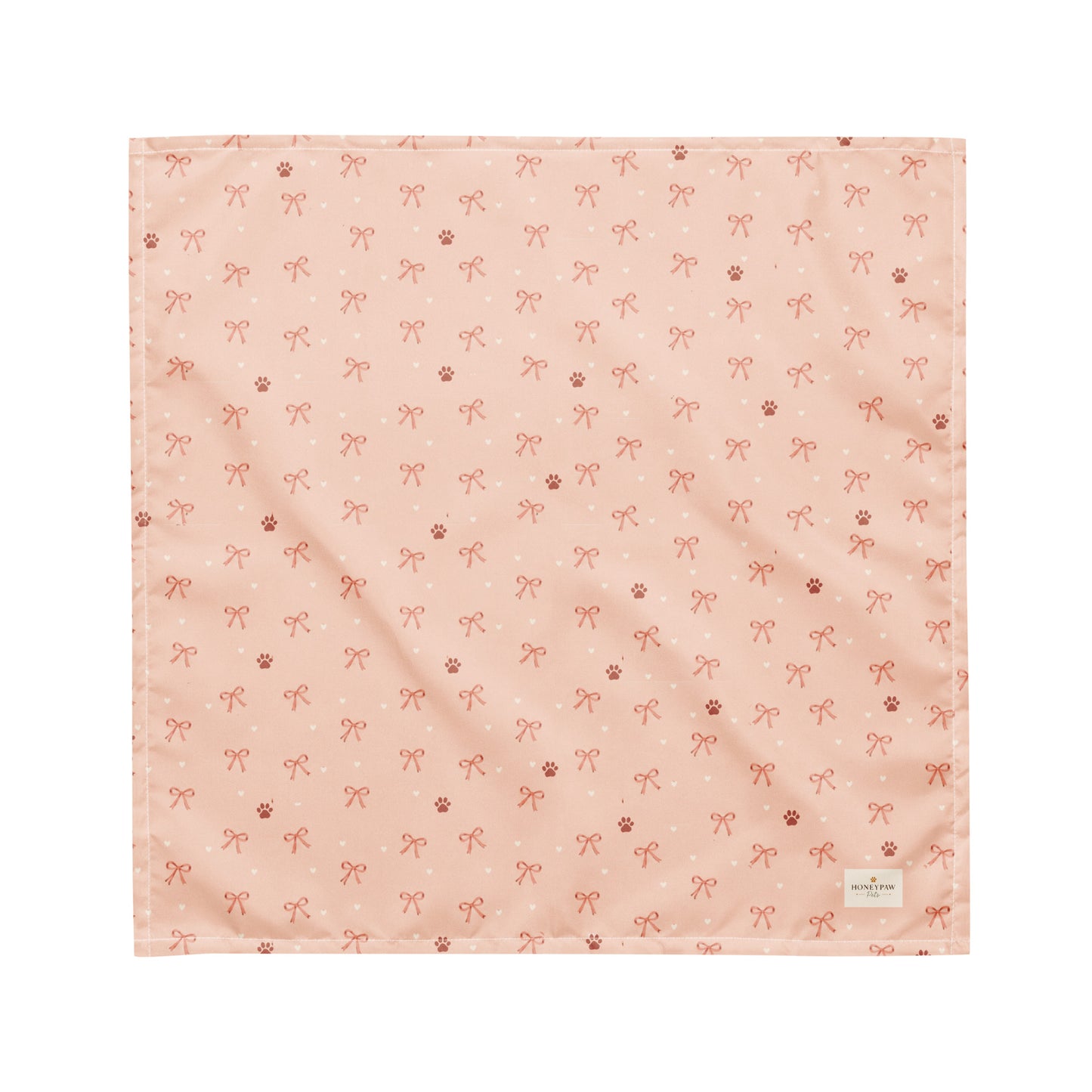 Sweetheart Pup Display dog bandana featuring delicate bow and paw print accents on a blush pink background by HoneyPaw Pets.