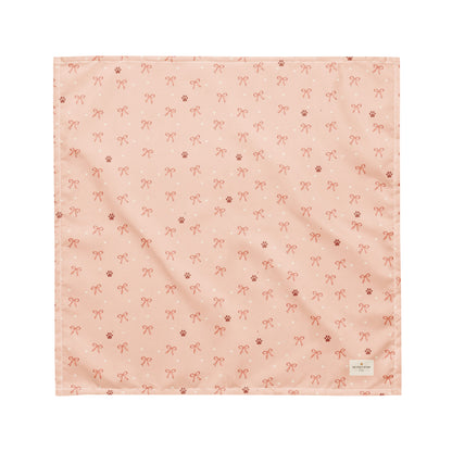 Sweetheart Pup Display dog bandana featuring delicate bow and paw print accents on a blush pink background by HoneyPaw Pets.