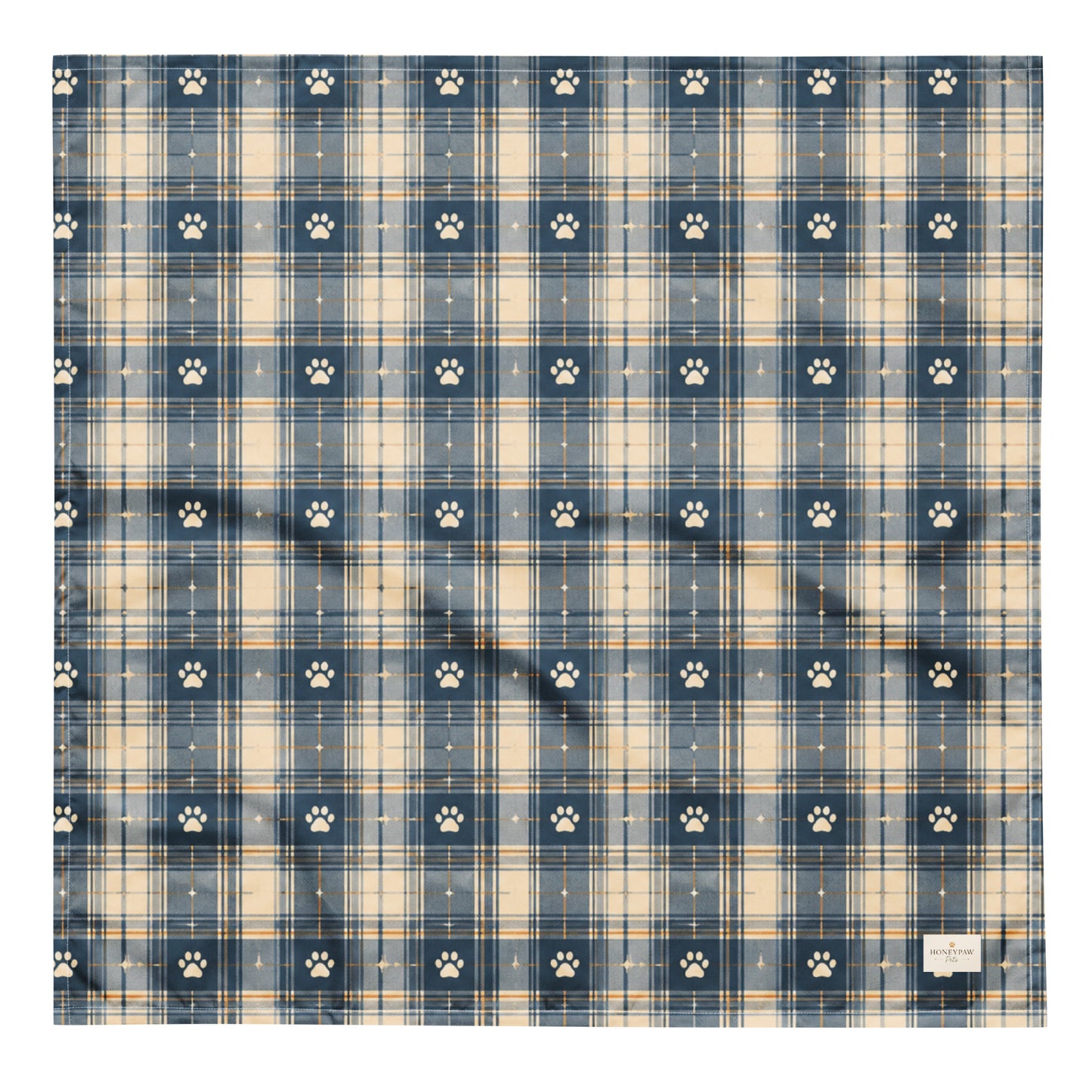 Tailwinds dog bandana featuring a navy blue plaid pattern with paw prints by HoneyPaw Pets