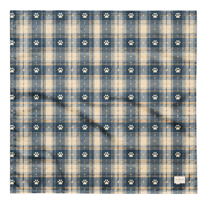 Tailwinds dog bandana featuring a navy blue plaid pattern with paw prints by HoneyPaw Pets