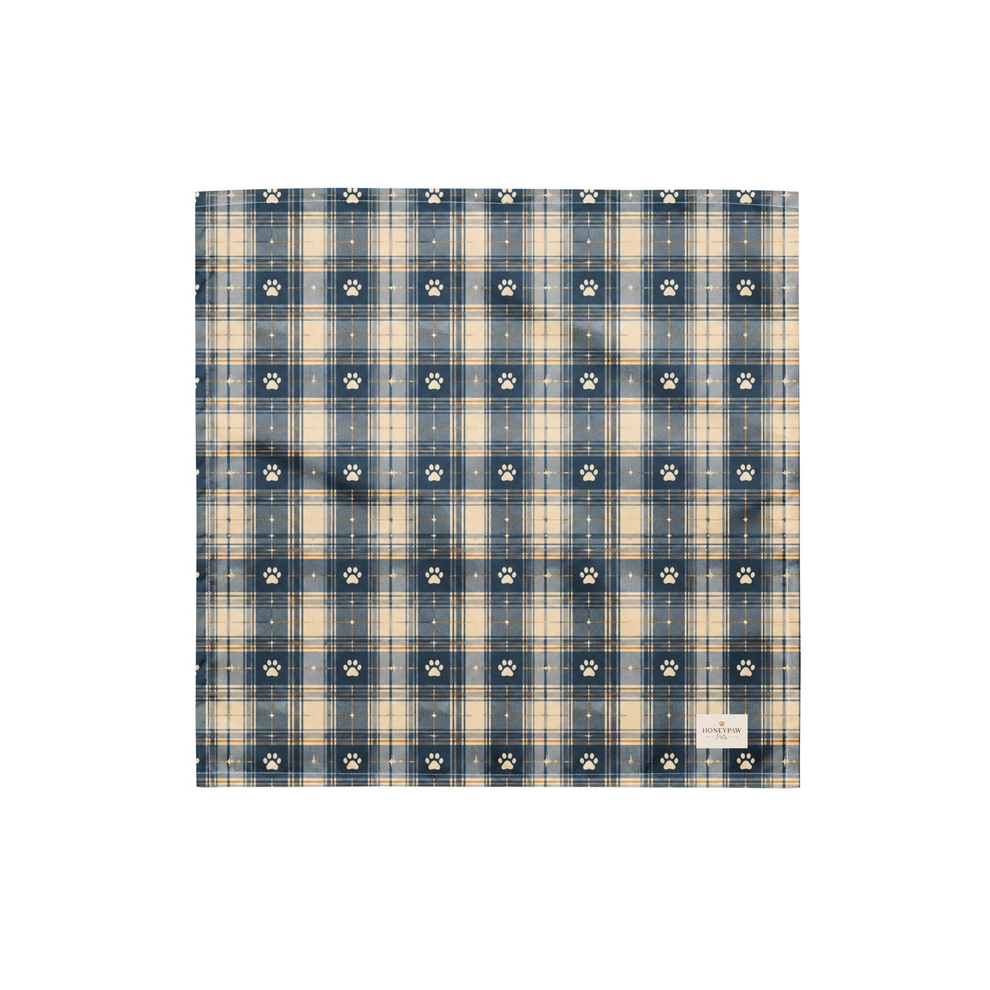 Tailwinds dog bandana featuring a navy blue plaid pattern with paw prints by HoneyPaw Pets