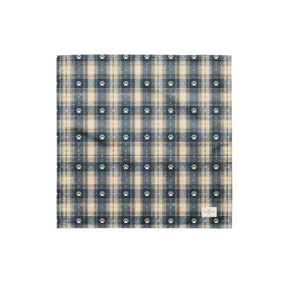 Tailwinds dog bandana featuring a navy blue plaid pattern with paw prints by HoneyPaw Pets