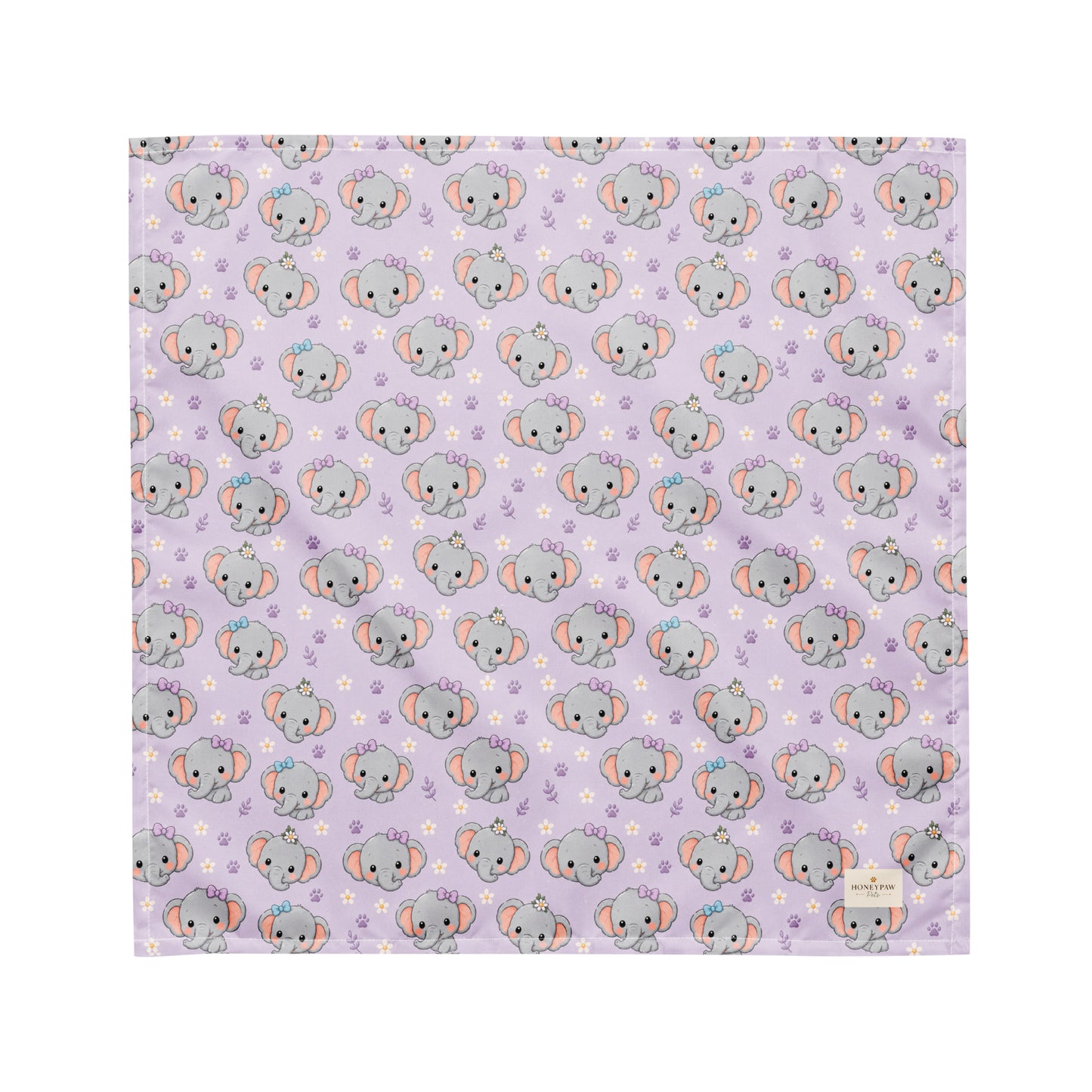 Tiny Tusks dog bandana featuring elephant faces and paw prints on a lavender background by HoneyPaw Pets