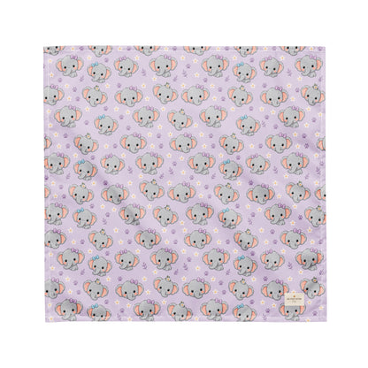 Tiny Tusks dog bandana featuring elephant faces and paw prints on a lavender background by HoneyPaw Pets
