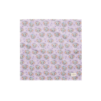 Tiny Tusks dog bandana featuring elephant faces and paw prints on a lavender background by HoneyPaw Pets