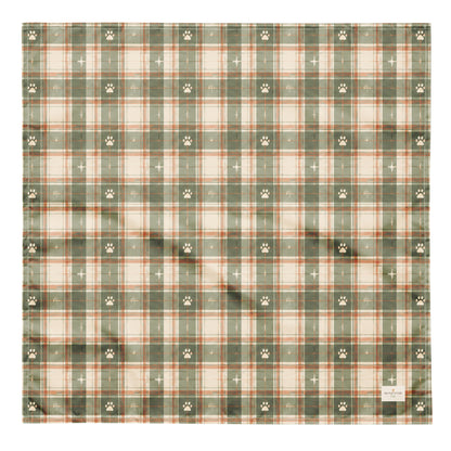 Trail Buddy dog bandana featuring a green plaid pattern with paw prints by HoneyPaw Pets.
