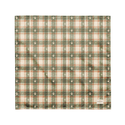Trail Buddy dog bandana featuring a green plaid pattern with paw prints by HoneyPaw Pets.