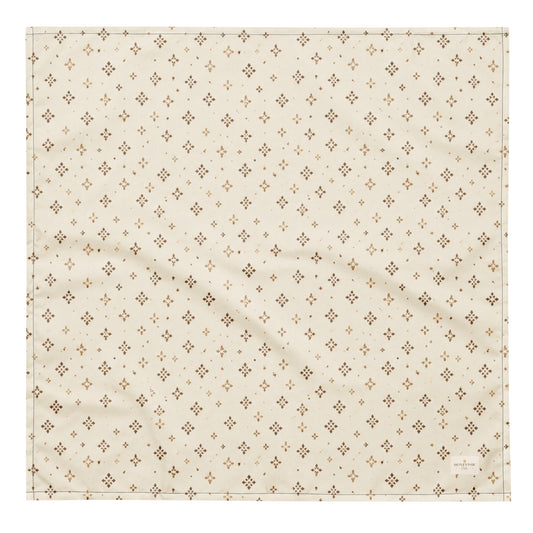 Tumbleweed Tails dog bandana featuring a cream background with a subtle western-inspired geometric pattern in warm tan tones by HoneyPaw Pets.