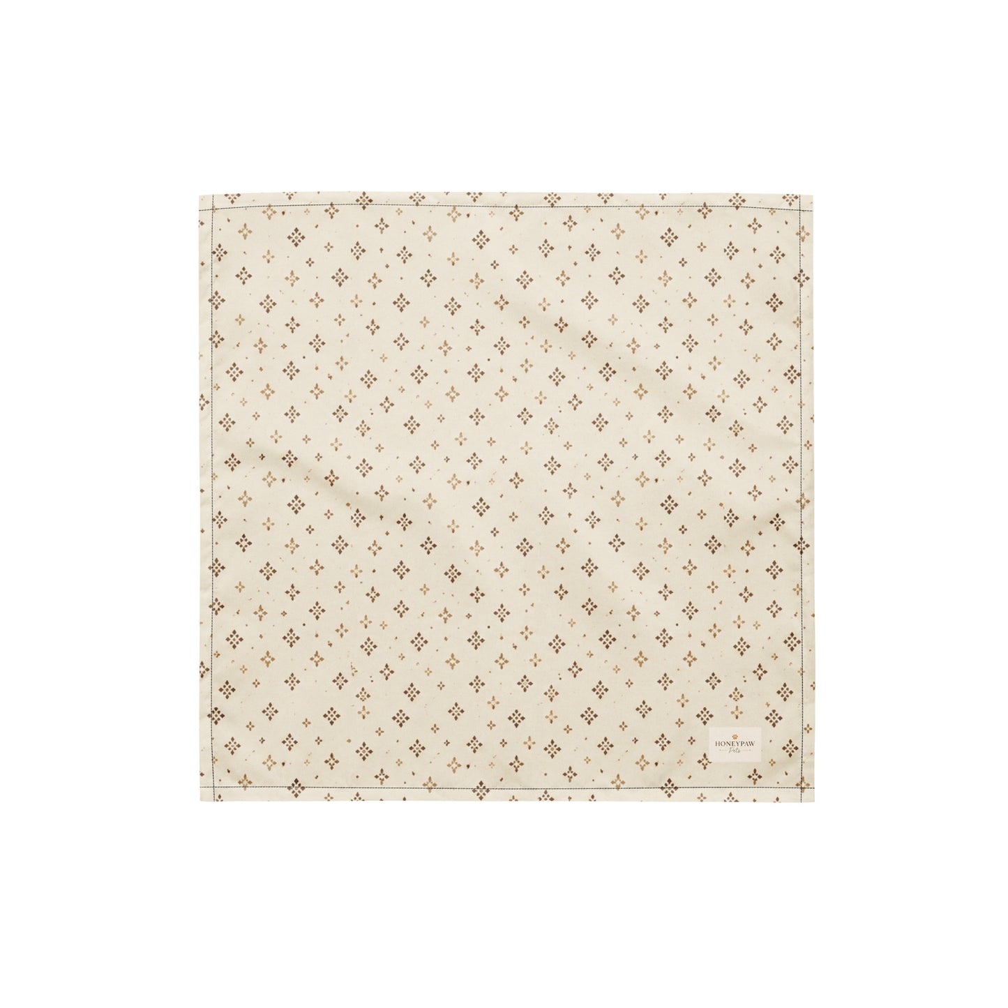 Tumbleweed Tails dog bandana featuring a cream background with a subtle western-inspired geometric pattern in warm tan tones by HoneyPaw Pets.