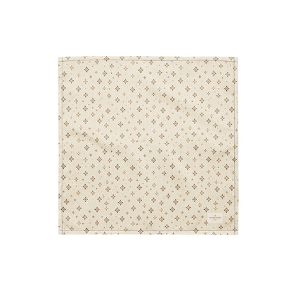Tumbleweed Tails dog bandana featuring a cream background with a subtle western-inspired geometric pattern in warm tan tones by HoneyPaw Pets.