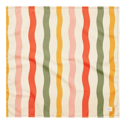 Tutti Frutti dog bandana featuring playful wavy stripes in coral, sage green, blush pink, and golden yellow on a cream background by HoneyPaw Pets.