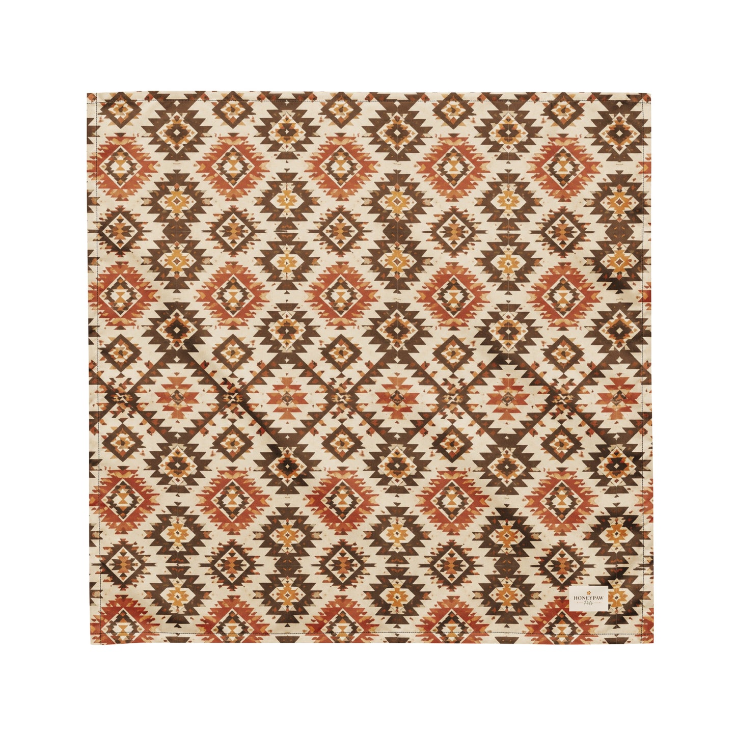 Waggin’ West dog bandana featuring a southwestern-inspired geometric pattern in warm brown, rust, and cream tones by HoneyPaw Pets.