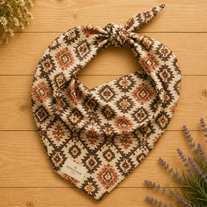 Waggin’ West dog bandana featuring a southwestern-inspired geometric pattern in warm brown, rust, and cream tones by HoneyPaw Pets.
